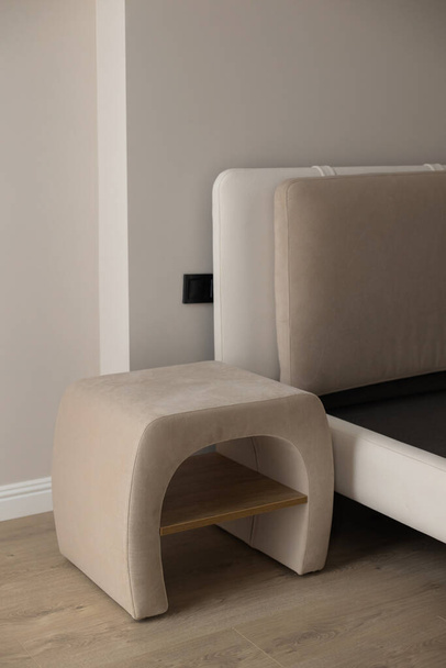 Beige bedside table in a modern interior - Photo, Image