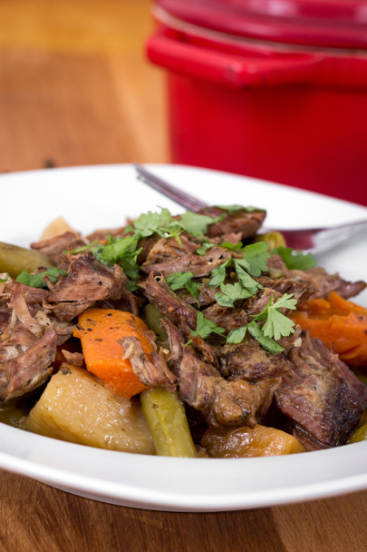 Braised beef pot roast stew with vegetables on table - Photo, Image