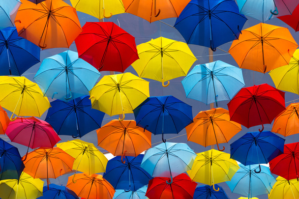 Umbrellas coloring the sky - Photo, Image