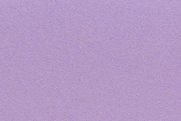 Fioletowy lawendowy kolor tła. Porowata teksturowana czysta powierzchnia z przestrzenią do kopiowania. - Zdjęcie, obraz