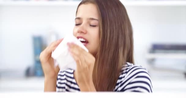 Sneeze, tissue and face of a woman in her office with the flu, covid or hayfever allergies. Sick, illness and portrait of a female employee with sinus, cold or allergy blowing her nose in workplace - Séquence, vidéo