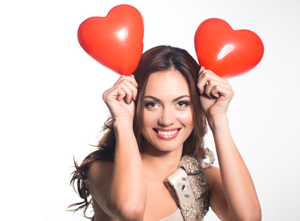 Young woman portrait with heart balloons - Photo, image