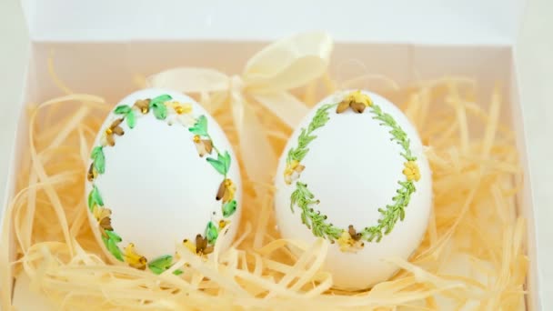 ribbon embroidery on eggshells ribbon embroidery technique on empty egg not chicken eggs turkey or goose eggs technique itself to embroider on eggshells Easter holiday originated in Germany two eggs - 映像、動画