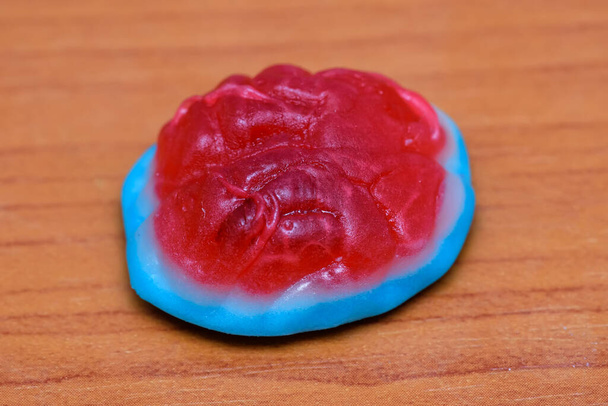 Colorful Fruity Gummy Candy. Halloween Jelly candies in the form of Human brain - Photo, Image