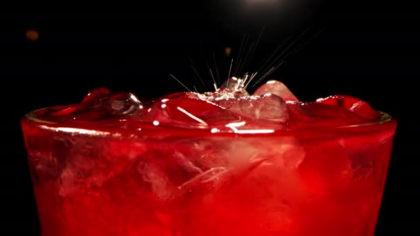 Preparation of a refreshing summer drink - lemonade from grapefruit, lemon, mint, red currant, ice with syrup and water. - Footage, Video