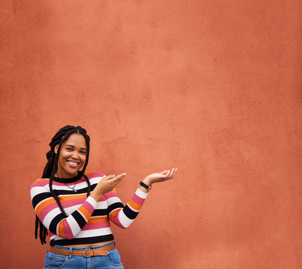 Mockup, portrait or happy black woman with marketing, product placement or branding space on wall background. African gen z girl advertising discount deal news, sales offer or promotion announcement. - Fotografie, Obrázek