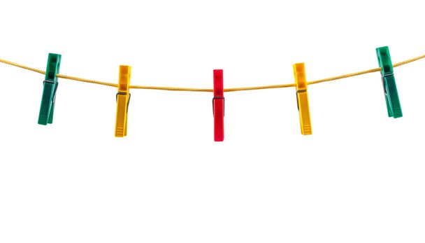 Красочные колышки на веревке
 - Фото, изображение