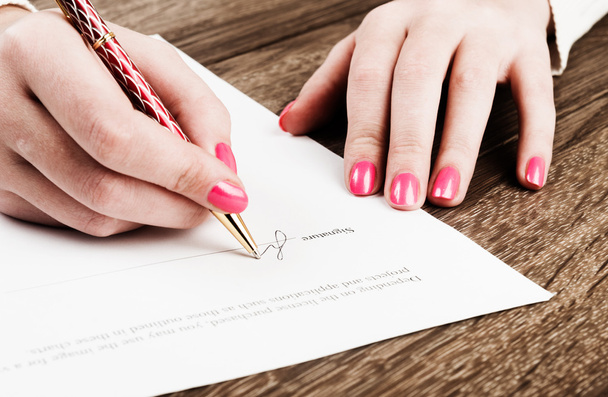 Businesswoman signing contract - Photo, Image