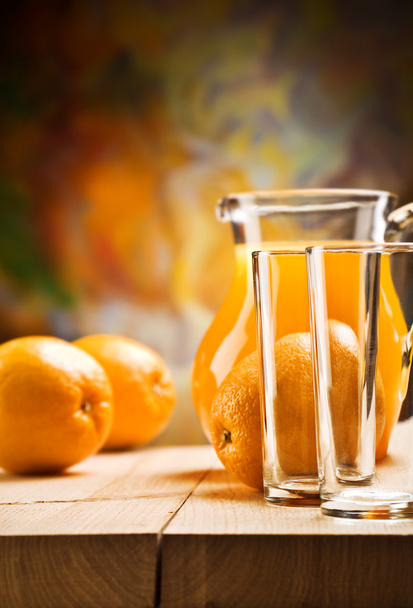 Emrty glassware and oranges - Foto, imagen