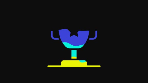 Yellow Award cup icon isolated on black background. Winner trophy symbol. Championship or competition trophy. Sports achievement sign. 4K Video motion graphic animation. - Filmagem, Vídeo