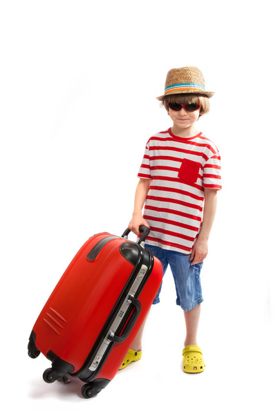 Small  tourist with a red suitcase - Foto, Imagem