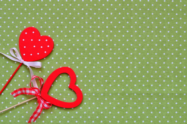 Love handmade hearts on green texture background, valentines day card concept - Photo, Image