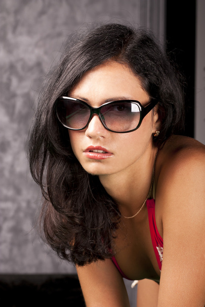 Beautiful young lady in elegant sun glasses - Фото, изображение