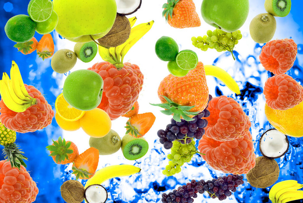 Mixed colorful fruit on a white background - Foto, imagen