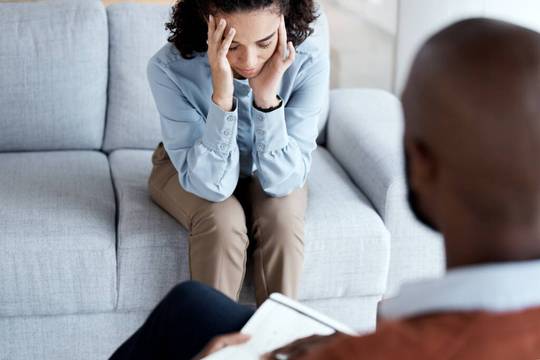 Counselling, therapy and depression of black woman with mental health problem on psychologist couch. Patient person talking to therapist man about psychology, anxiety and trauma or stress for help. - Foto, Bild