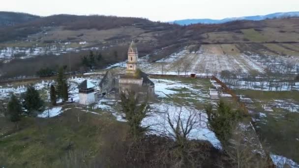 Densus Christian Church in the village Densus, Transylvania, Romania, Europe. Drone footage. - Materiał filmowy, wideo