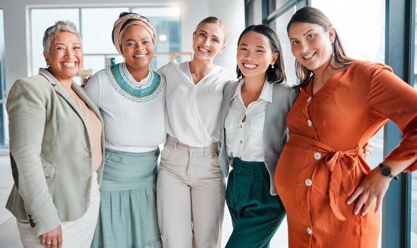 Women, business solidarity and team portrait in office, excited with support, pregnancy and care. Group, pregnant woman and together with love, community diversity and happy at financial workplace. - Fotó, kép