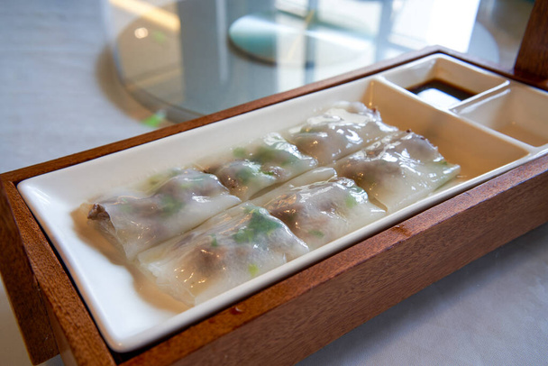 A classic and delicious Cantonese morning tea, steamed beef rice rolls - Foto, Bild