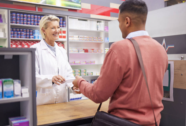 Pharmacist, doctor and customer for medicine in store with mockup stock for healthcare. Woman and man talking for advice on pills or Pharma product for medical retail service, health and wellness. - Фото, зображення