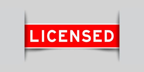 Inserted red color label sticker with word licensed on gray background - Vector, Image