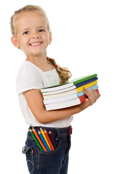 Little girl with lots of books - Foto, Imagen