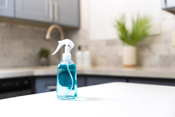 Cleaning  spray in a kitchen - Foto, Imagem