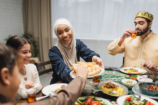 Middle eastern family having iftar dinner during ramadan  - Photo, Image