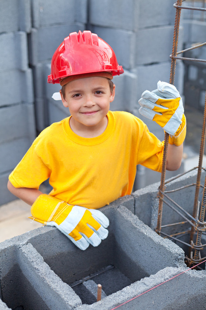 Boy at construction site - Foto, Bild