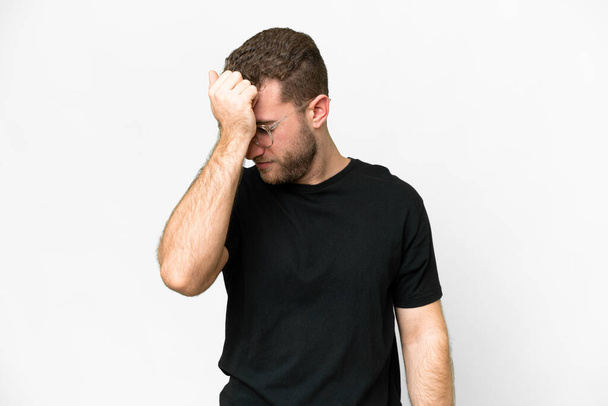 Young handsome blonde man over isolated white background with headache - Photo, image