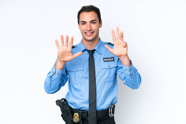 Молодий поліцейський кавказький чоловік ізольований на білому тлі підрахунок дев'яти пальцями
 - Фото, зображення