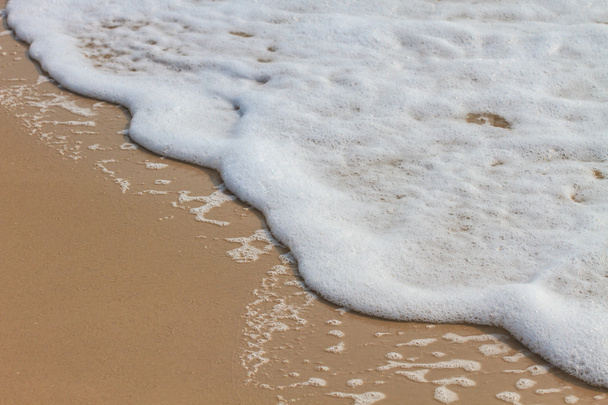 homokos strand és a hullám - Fotó, kép