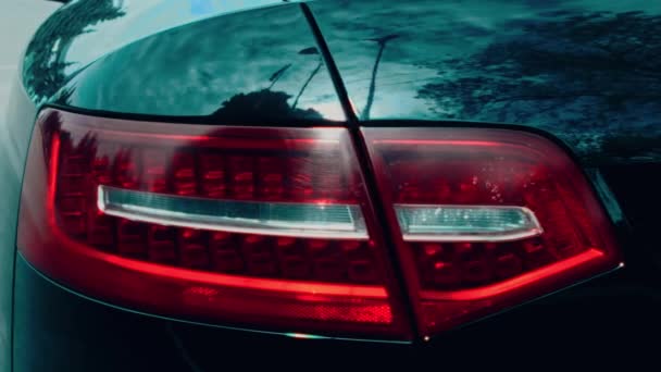 Close up of car headlights of a car. Car details presentation in slowmotion. - Materiał filmowy, wideo