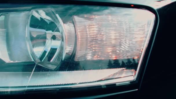 Close up of car headlights of a car. Car details presentation in slowmotion. - Séquence, vidéo