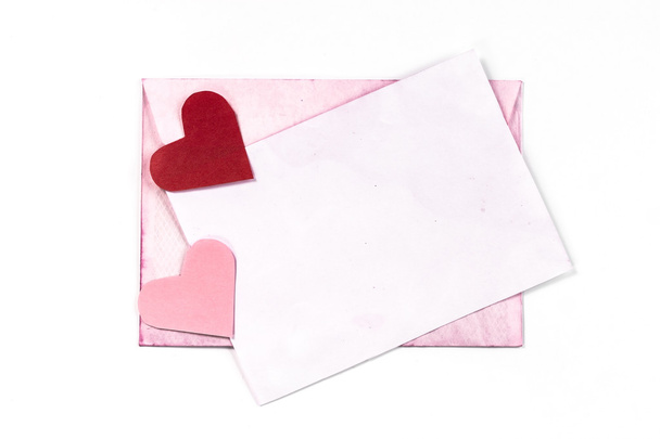 Isolated vintage pink envelope with hearts - Fotografie, Obrázek
