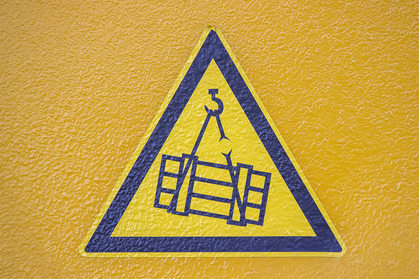 Overhead kraan crush gevaar teken - Foto, afbeelding