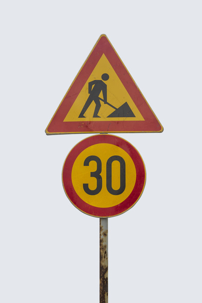 Знаки руху для будівельних робіт на вулиці та обмеження швидкості
 - Фото, зображення