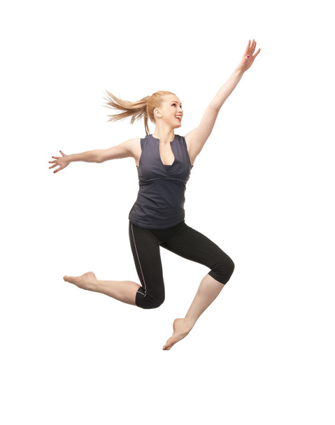Jumping sporty girl - Zdjęcie, obraz