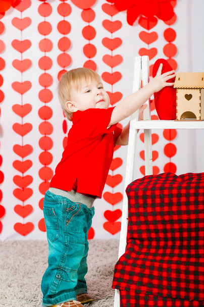 Little boy with decorations on Valentine's Day - 写真・画像