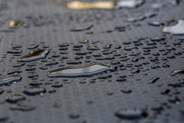 water tears on black floor, high quality photo - Fotografie, Obrázek