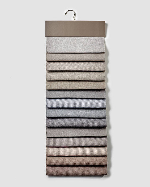 Collection of natural upholstery fabric samples in beige and gray tones for soft comfortable furniture, designer curtains or sturdy homewares. Interior color choice concept - Fotografie, Obrázek