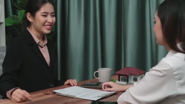 Enthusiastic businesswoman handshake after successful business agreement deal in office. Client handshake with corporate lawyer and company representative. - Footage, Video
