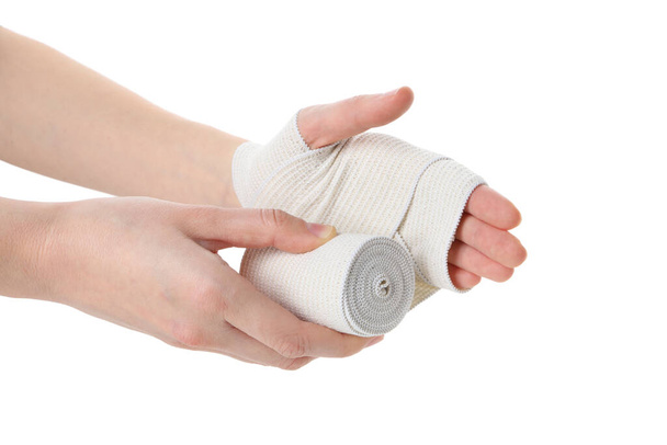 Hands with elastic bandage isolated on white background - Photo, Image
