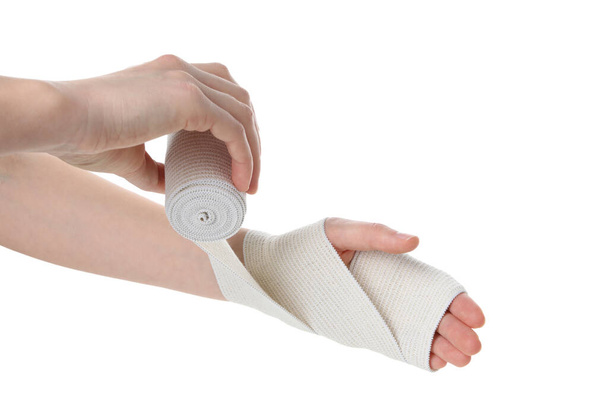 Hands with elastic bandage isolated on white background - Photo, image