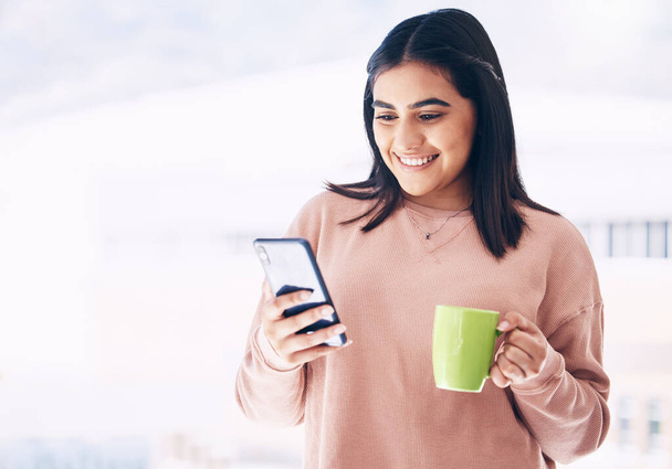 Happy woman, phone or drinking coffee in house on social media app, mock up website or internet email news. Smile, student or relax person with tea cup, mobile blog or mockup communication technology. - Photo, Image