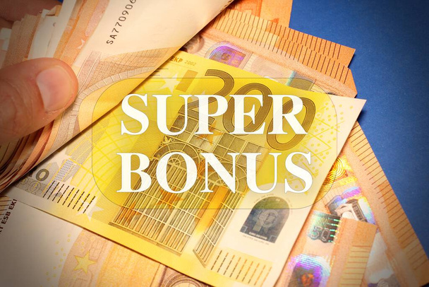 Евро банкноты с текстом "Super Bonus" - Фото, изображение
