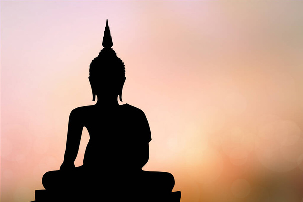 big buddha silhouette sunset background.Makha Bucha Day.Vesak Day.Asanha Bucha.Buddhist Lent. - Photo, Image