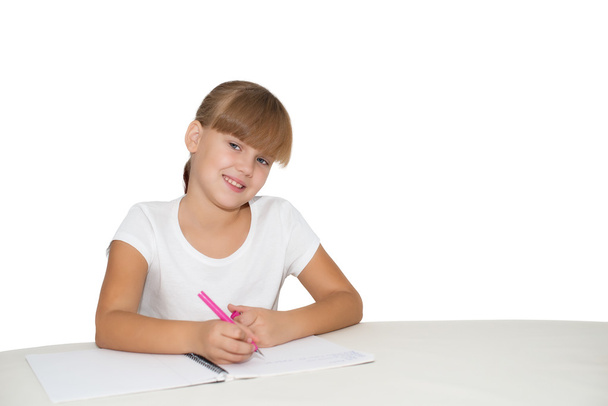 Little girl doing homework - Foto, Imagen