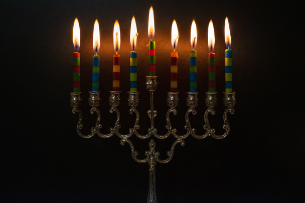 Hanukkah burning Candles. Chanukah Menorah Chanukiah. Lights the menorah for Hanukkah. Jewish holiday. Tradition is a religion ritual. Judaism background banner. burning holy candle - Photo, Image