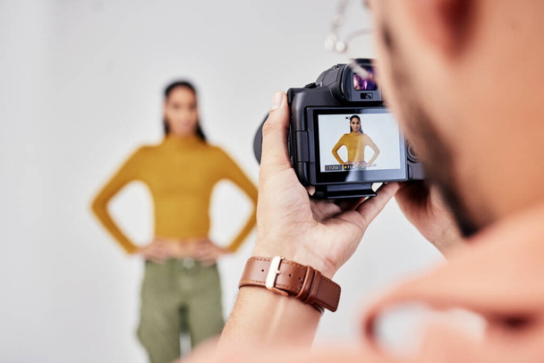 Camera, photography and photographer with woman fashion model in studio for creative, advertising and image. Media, backstage and professional man with girl and equipment for photoshoot capture. - Fotoğraf, Görsel