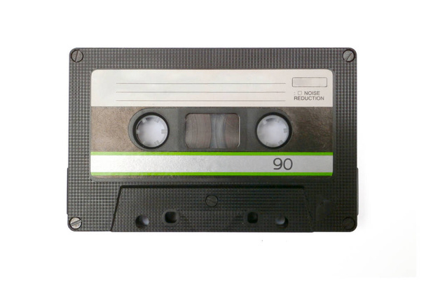 Studio shot of a vintage audio cassette from the eighties isolated on a white background. - Fotografie, Obrázek